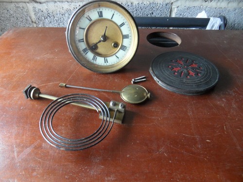 Antique circular brass clock - circular,