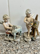 vintage porcelain cherub's