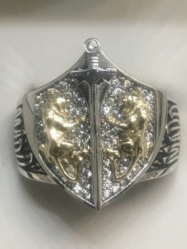 Sterling silver and 14k - , lions
