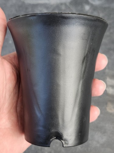 Round black plastic plant pot - round,