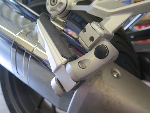 Pillion footrest lowering