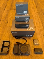 Ricoh GR IV w/ extra battery, dual charger, micro sd & flash. Perfect condition.