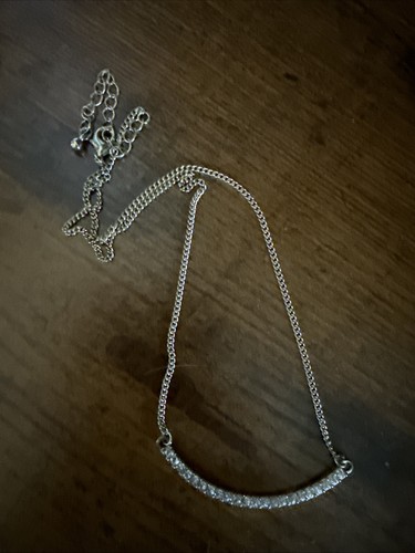 Goldtone rhinestone bar - &,