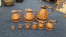 Graduated Copper Measuring Jugs. Antique