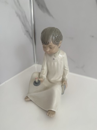 Genuine nao lladro boy - by,