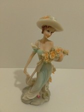 Elegant Lady Figurine Carrying
