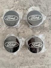4 x BLACK FORD CENTRE CAPS 54MM ALLOY WHEEL FOCUS FIESTA KA