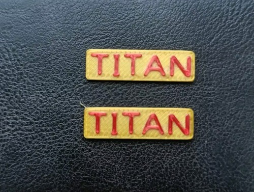 Printed gold titan name - 3d,
