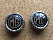 MGB Rostyle wheel centre caps. One pair. NOS.