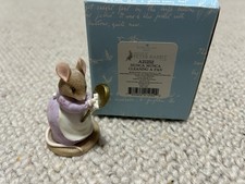 Hunca Munca Cleaning A Pan