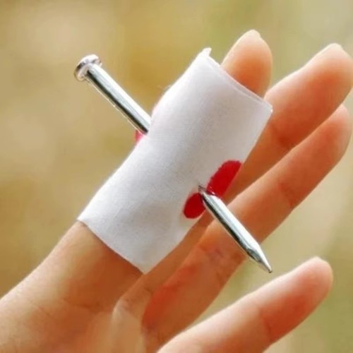 Nail through finger with - nail,