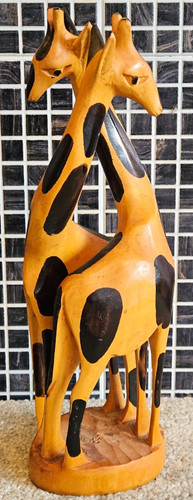 Hand crafted wooden giraffe - hand,
