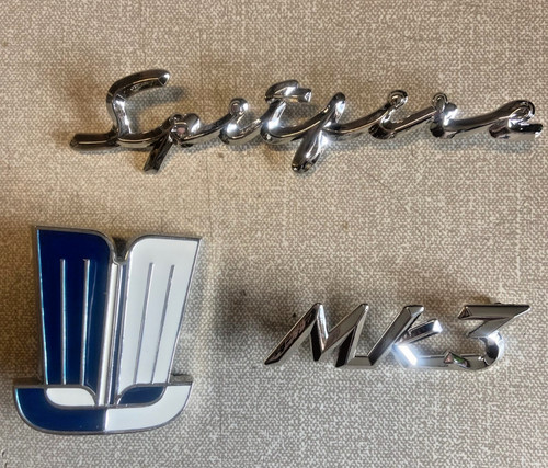 Triumph badge set spitfire - ,,