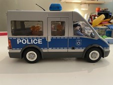 Playmobil police van with accessories and mini figures