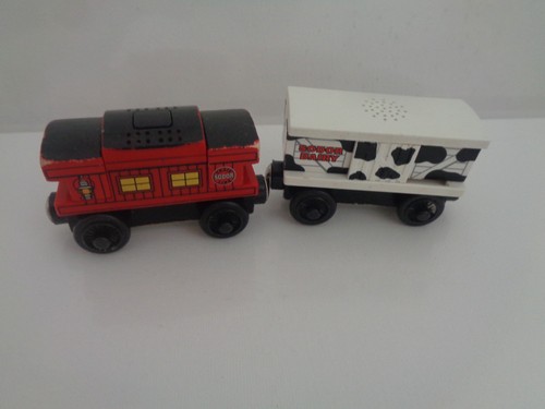 Wooden railway carriage mooing - carriage,