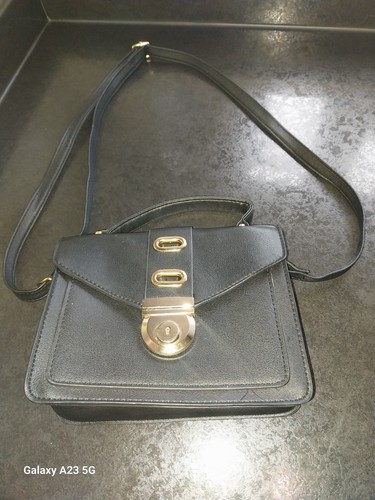 Small black shoulder - shoulder, handbag