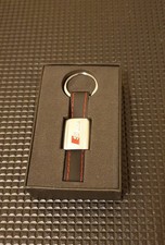 Keyring with Audi S Line Logo. Black with Red Stitching.