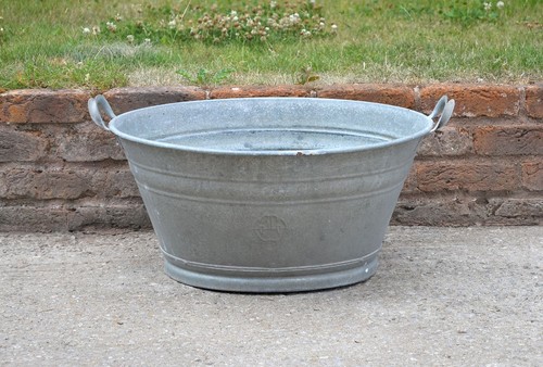 Old galvanised washing bowl - old,