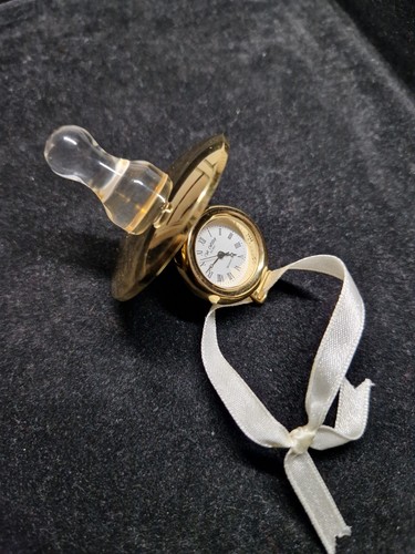 Miniature quartz brass baby - miniature,