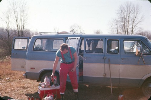 1975 man setting camp food - 1975,