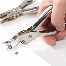 Single hole punch for paper