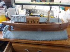 a scratch built wooden model of a steam boat