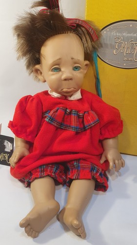 Hard plastic spanish doll - plastic,