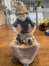 Porcelain Figure Titled "Sitting Lady With Puppies By Nao( Lladro)