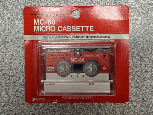 Realistic micro cassette - realistic,