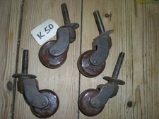 SET OF 4  ANTIQUE  CASTORS