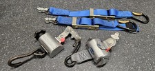 Wheelchair securing straps