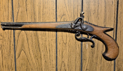 Sexton metal pistol - , wall