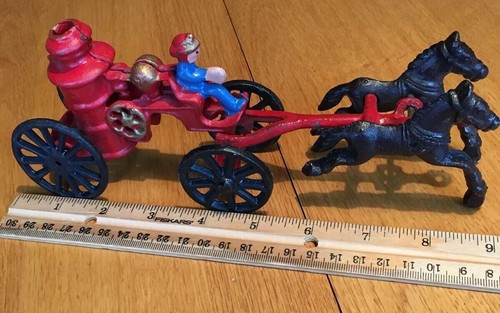 Vintage horse drawn fire truck - drawn,