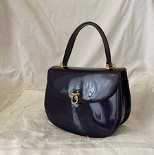 Launer Nocturn bag, new condition never used. Flap linning fade slightly