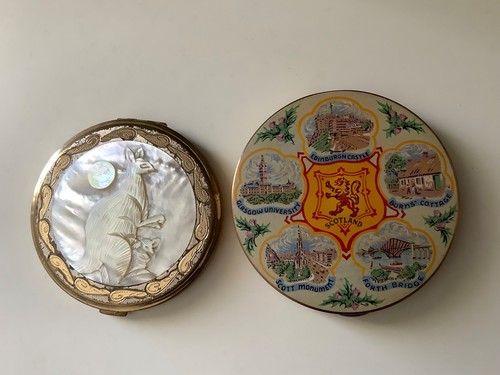 Two powder compacts - powder,