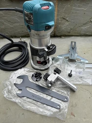 Makita rt07cx4 710w - makita, 1/4"