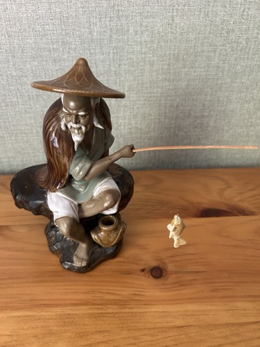 Chinese mudman fishing - chinese,