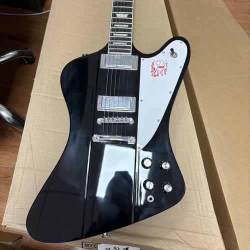 Firebird black electric guitar