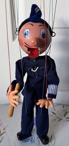 Policeman with truncheon - with,