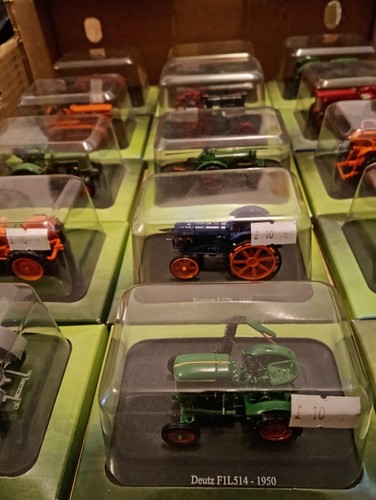 Die cast model tractors - x,