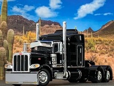 1/64 DCP BLACK PETERBILT 389 W/ 63" MID ROOF SLEEPER W/ WHALE TAIL