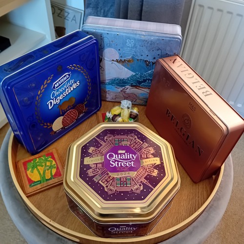 Empty tins quality street - empty,