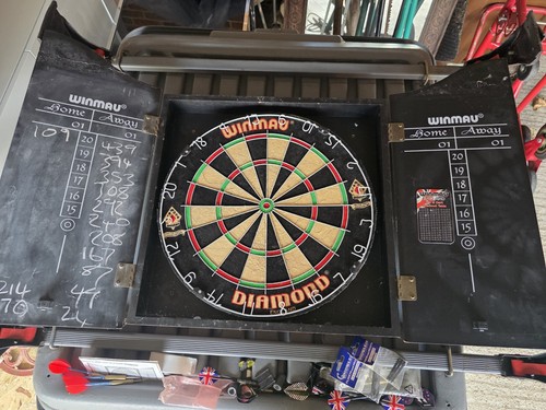 Winmau dart board with - , storage