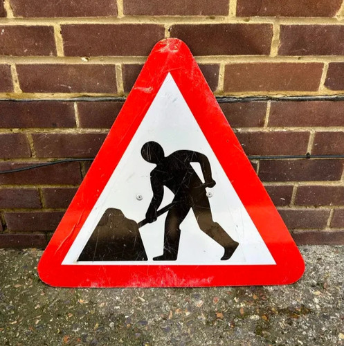 Men work road - at,