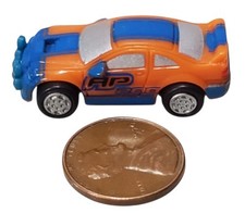 Small Hasbro Micro Machine Rally Car in Orange & Blue marked AP-200