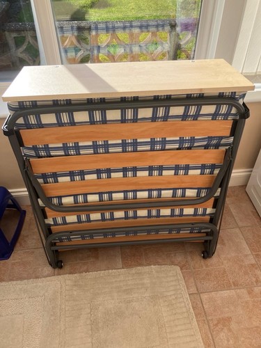 Compact folding bed with - folding,