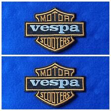 A Pair Of Vespa Scooter