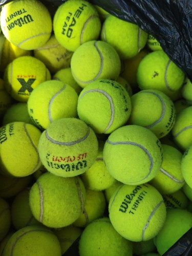 Used tennis balls branded - balls,
