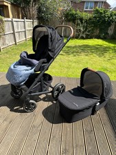 nuna mixx pram / carry cot, excellent condition, all black with blue footmuff 