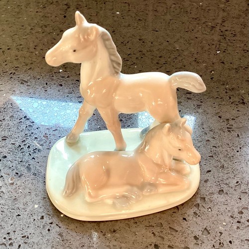John jenkins porcelain foals - john,